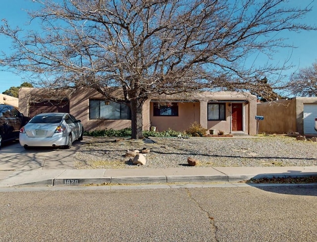 view of adobe home