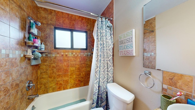 bathroom with toilet and shower / bath combo with shower curtain