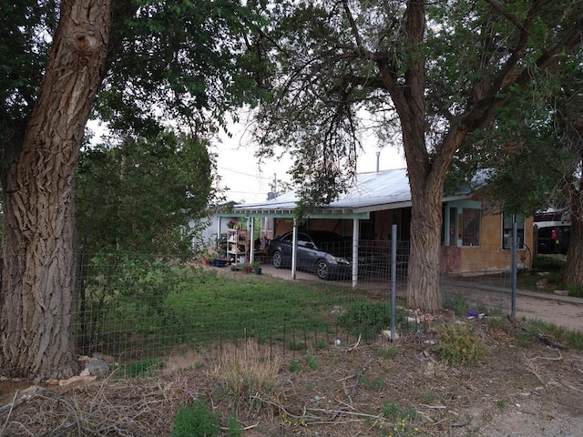 view of yard featuring a carport