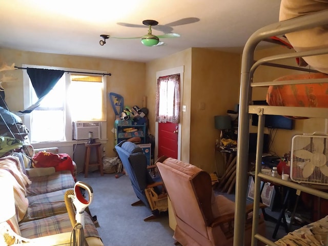 interior space featuring ceiling fan and cooling unit