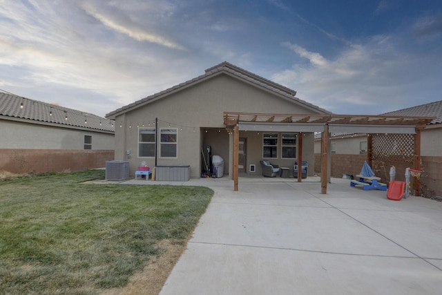 rear view of property with a yard, a patio, cooling unit, and a pergola