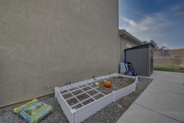 view of property exterior with a shed