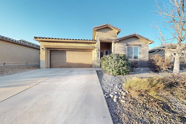 view of front of property with a garage