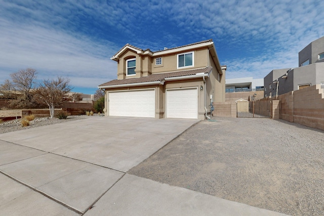 view of front of home with a garage