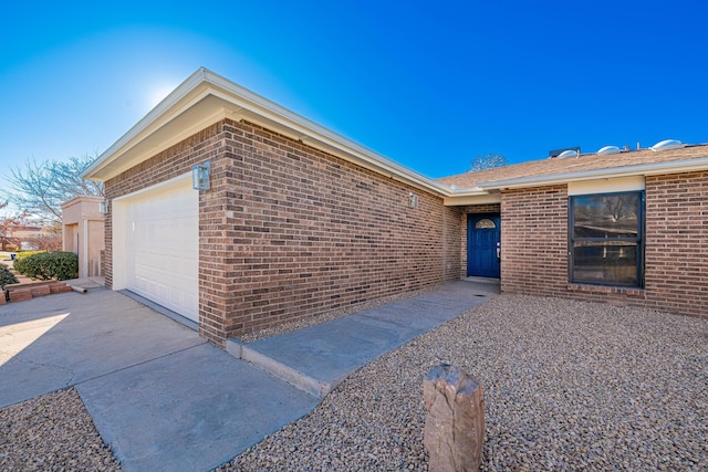 exterior space with a garage