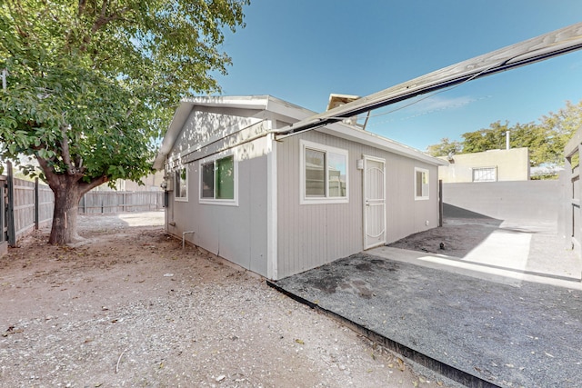 view of property exterior featuring a patio