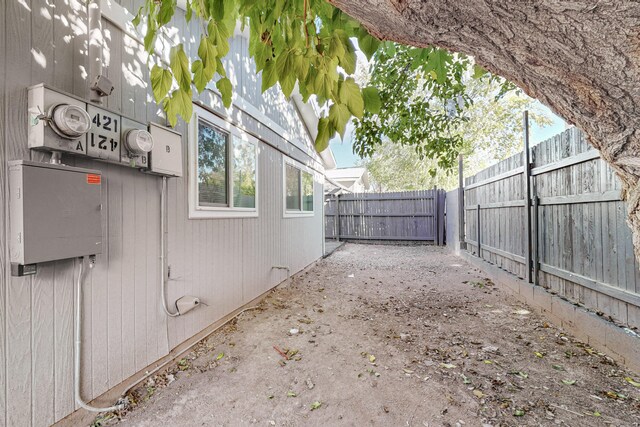 view of side of property featuring a patio area