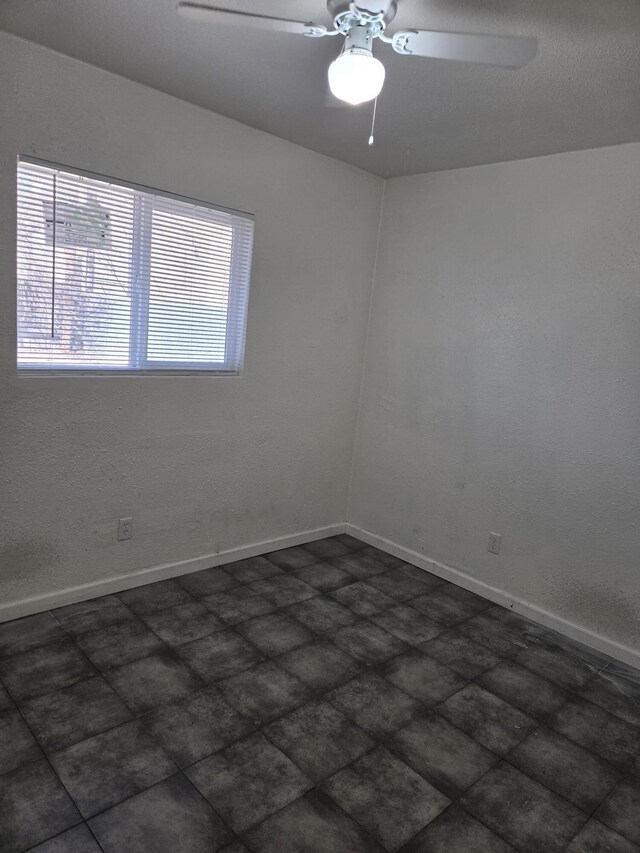 unfurnished room featuring ceiling fan