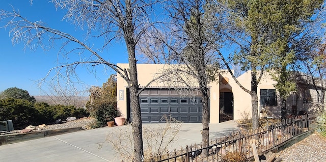 view of property exterior featuring a garage