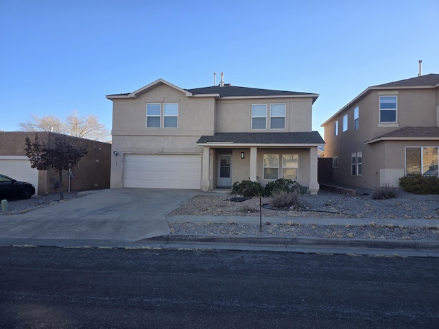 7708 Briar Ridge Ave NW, Albuquerque, NM 87114 - traditional-style house featuring stucco siding, an attached garage, driveway, and a shingled roof
