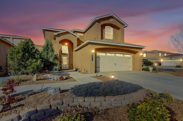 view of front of property featuring a garage