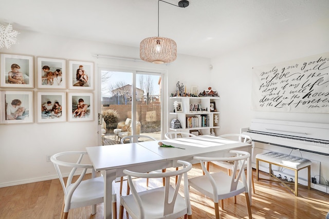 dining room featuring wood-type flooring