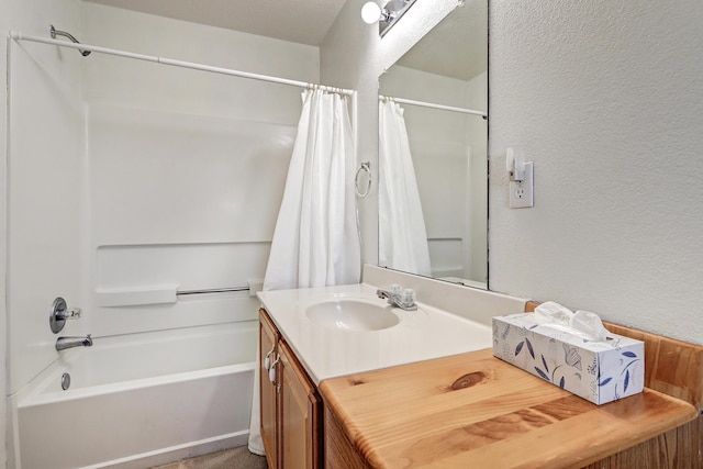 bathroom with vanity and shower / bath combination with curtain