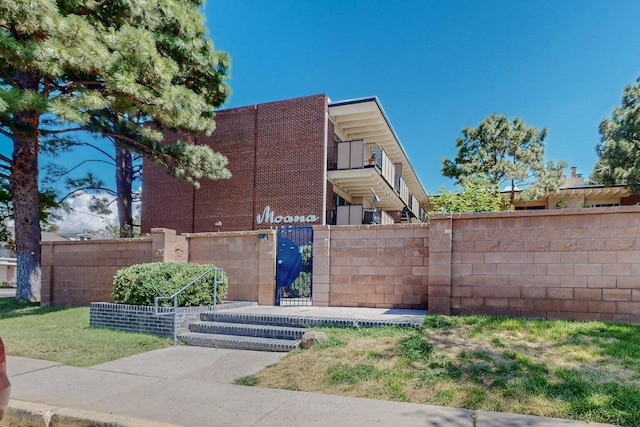 exterior space featuring a balcony