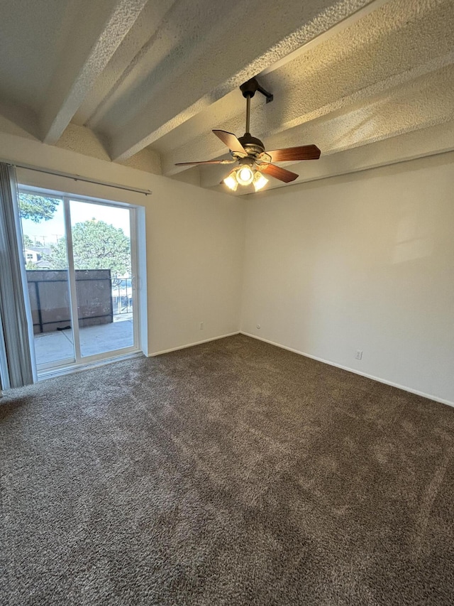 carpeted empty room featuring ceiling fan, beamed ceiling, and a textured ceiling