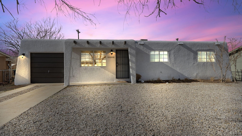 adobe home with a garage