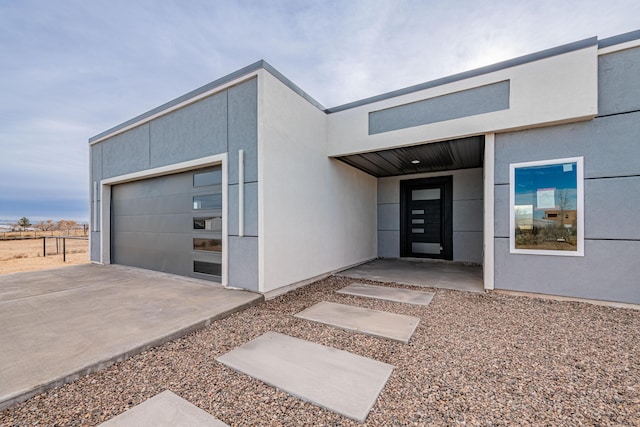 entrance to property featuring a garage