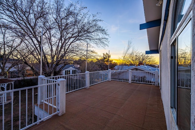 view of patio terrace at dusk