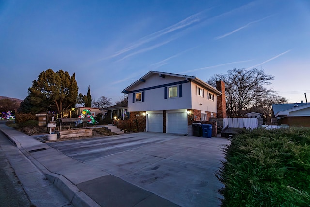 view of front of property with a garage