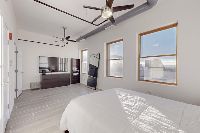 bedroom featuring ceiling fan and light wood-type flooring