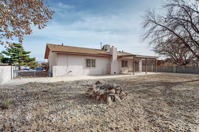 back of house featuring a patio and central AC