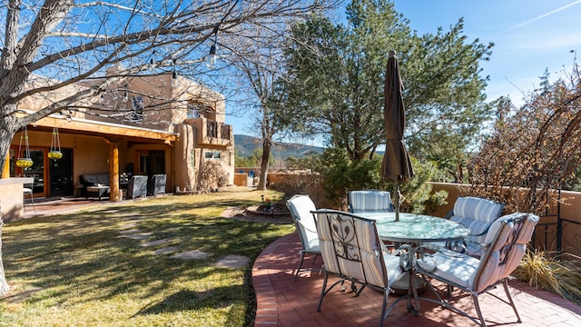 2 Chaco Ct, Sandia Park, NM 87047 - view of yard with a balcony, a patio, and outdoor dining space