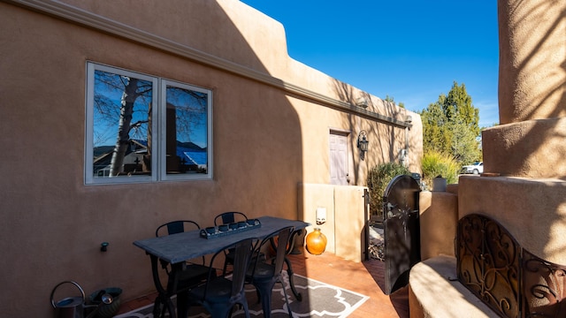 2 Chaco Ct, Sandia Park, NM 87047 - view of patio with outdoor dining area