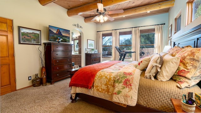 bedroom featuring light carpet, beam ceiling, ceiling fan, and wooden ceiling