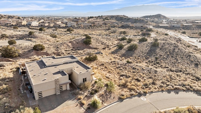 bird's eye view featuring a residential view and a mountain view