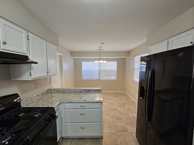 kitchen with a notable chandelier, kitchen peninsula, decorative light fixtures, white cabinets, and black appliances