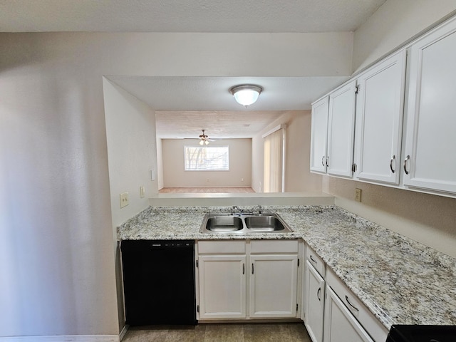 kitchen featuring ceiling fan, sink, range, black dishwasher, and white cabinetry