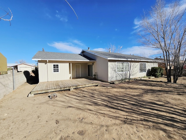 rear view of property with a deck