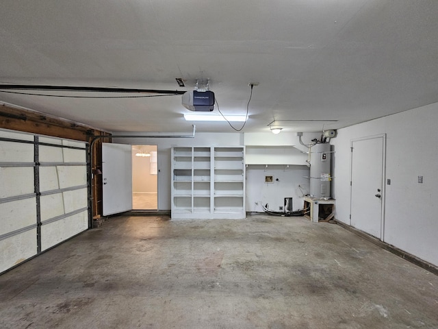 garage featuring strapped water heater and a garage door opener