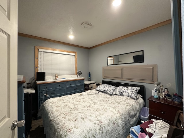 bedroom with crown molding