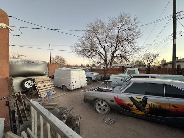 view of parking at dusk