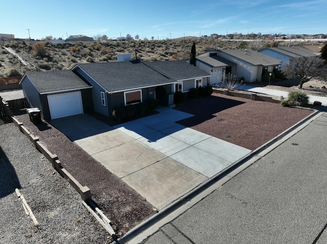 single story home with a garage