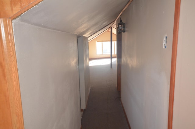 hall with lofted ceiling