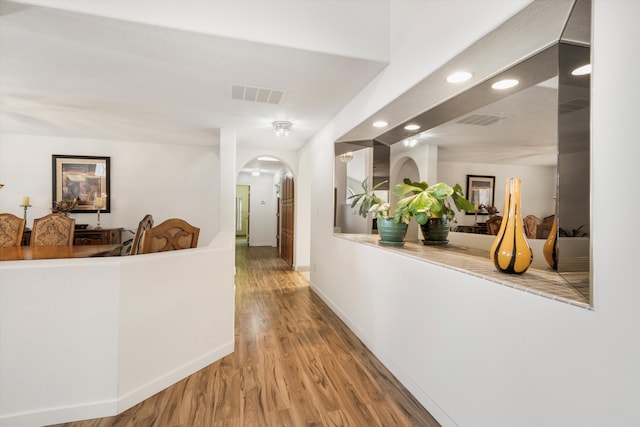 hall featuring hardwood / wood-style flooring