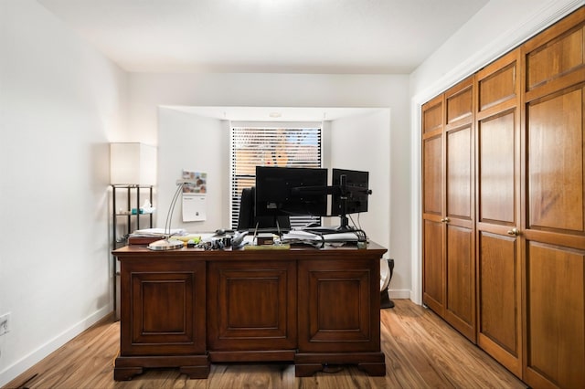 office space with hardwood / wood-style flooring