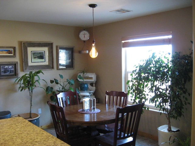 dining room featuring a healthy amount of sunlight