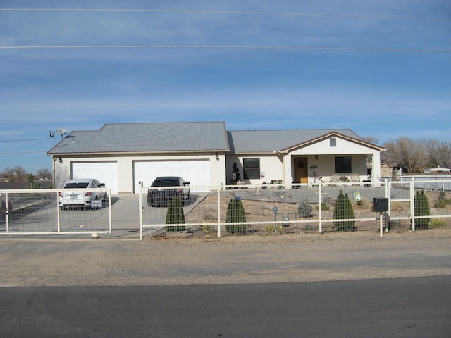 view of front of home featuring a garage