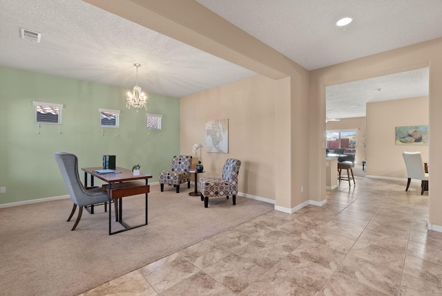 office with light colored carpet, a textured ceiling, and an inviting chandelier