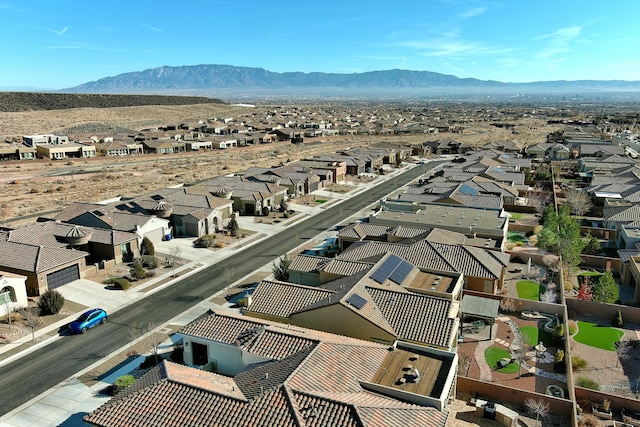 bird's eye view featuring a residential view and a mountain view