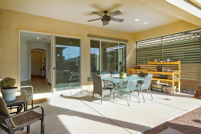 view of patio / terrace featuring outdoor dining area and ceiling fan