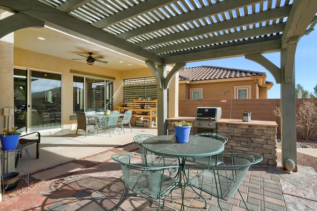 view of patio / terrace with outdoor dining space, fence, grilling area, and a pergola