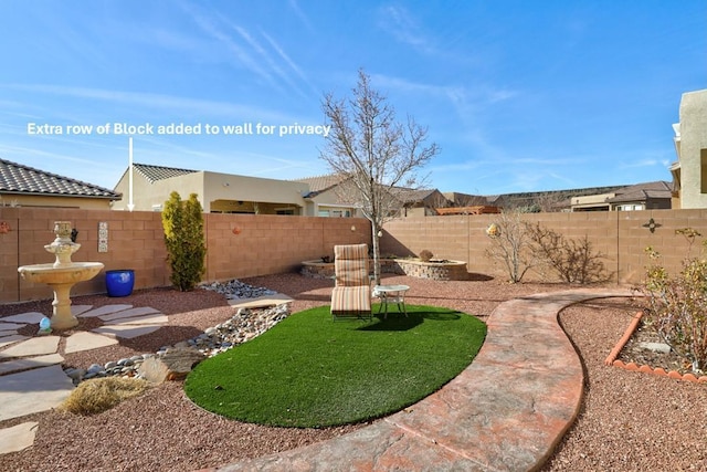 view of yard featuring a fenced backyard