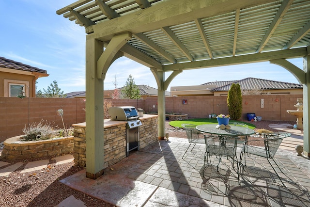 view of patio with outdoor dining space, a fenced backyard, a pergola, and area for grilling