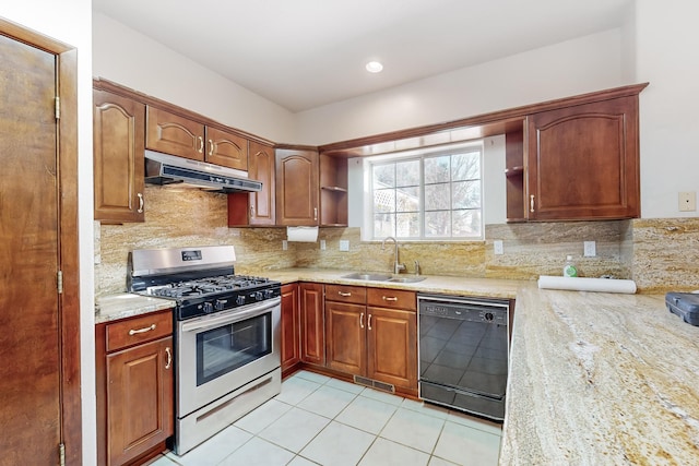 kitchen featuring light stone countertops, dishwasher, stainless steel range with gas cooktop, light tile patterned floors, and sink