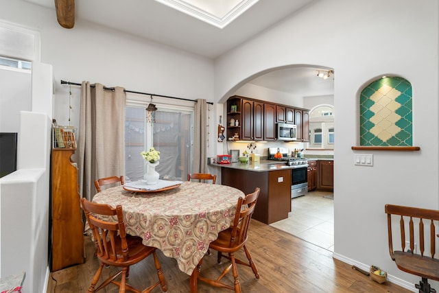 dining area with light hardwood / wood-style floors