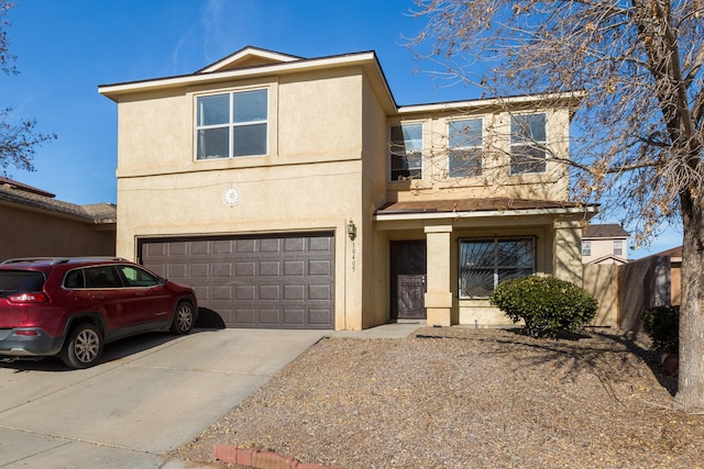 front of property with a garage